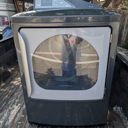 This item is a GE Profile Harmony Series clothes dryer. 