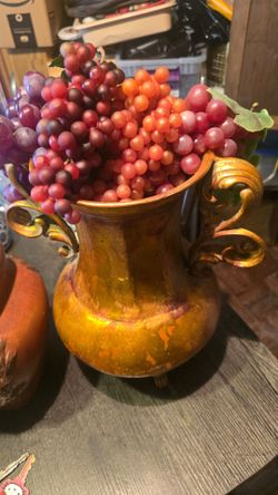 Beautiful jar with grapes