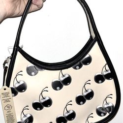 Ergo Bag In Coachtopia Leather With Cherry Print