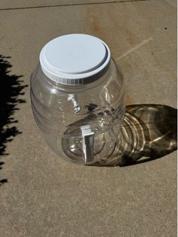 Plastic jugs with a pouring spout
