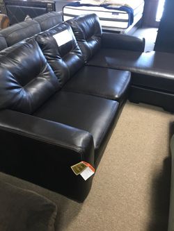 New Leather Sectional with Attached Chaise! Great couch and loveseat specials here!
