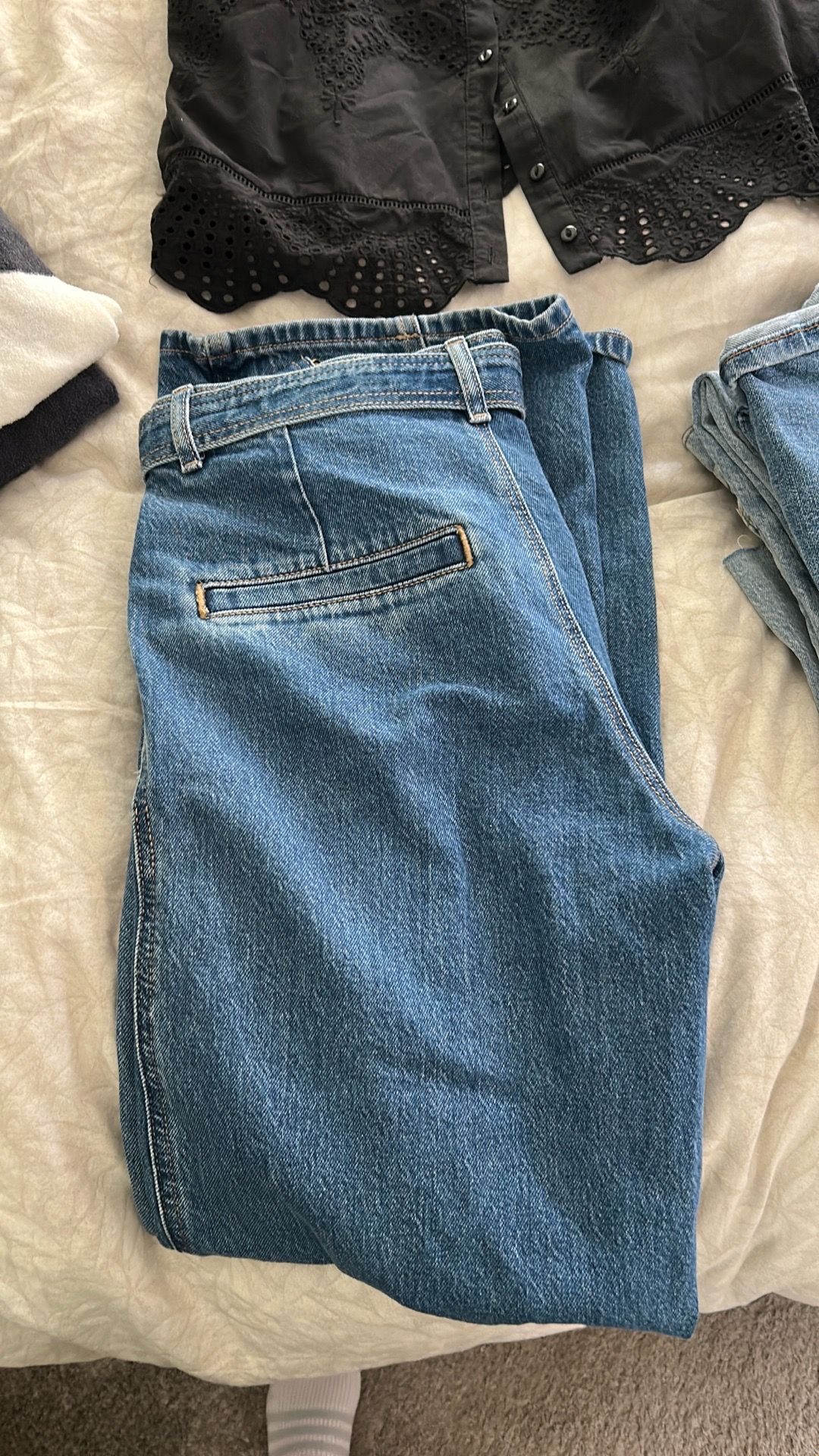 Jeans, sweaters, Addias tennis shoes and lounge wear