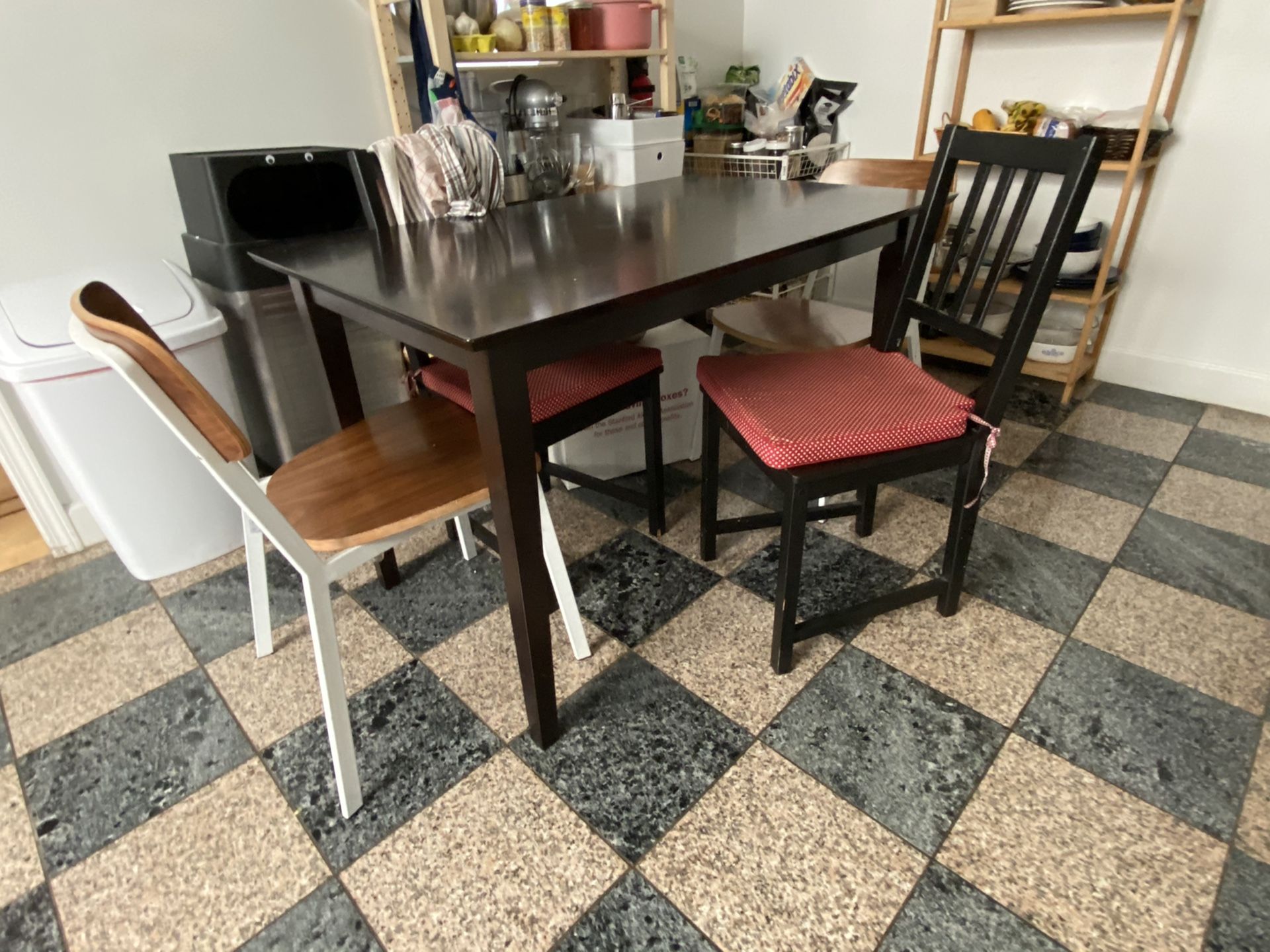 Dining table with 2 cushioned chairs