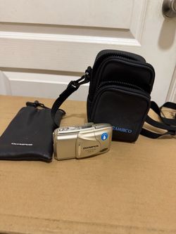 Olympus Infinity Stylus Epic Zoom 80 35mm Point & Shoot Film Camera Tested Works. Used in good with some cosmetic blemishes. These blemishes are in t