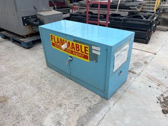 Metal two-door flammable cabinet (broken handle) 43” wide x 18” deep x 24” tall safe storage
