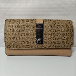Guess Laurel large zip-around wallet in a brown logo monogram pattern 