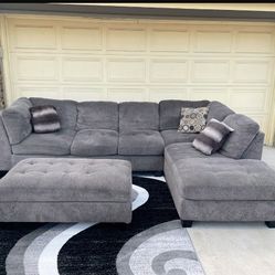 Gray 2 Piece Sectional With Ottoman And Storage, Jerome’s Trinton, Good Condition