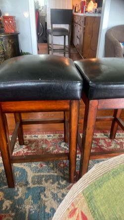 Two black barstools