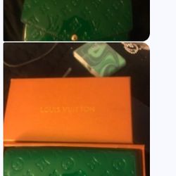 Louis Vuitton Finished Leather Clutch 