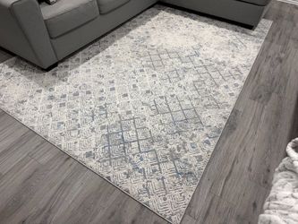 78” x 112” gray cream and blue rug
