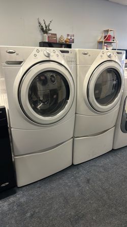 Front load Whirlpool washer and dryer set