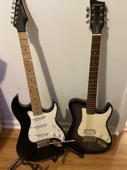 Guitars with stand and bags