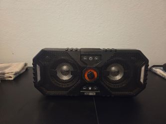 This is an Altec Lansing Xpedition 4 Portable Bluetooth Speaker model ALP-XP400 It is designed to be waterproof and features a multi-colored LED light