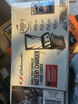Battery charger new /box open