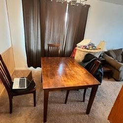 Wooden Dining table and 4 chairs