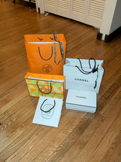 Assorted luxury brand paper bags