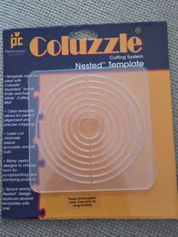 Coluzzle scrapbook cutting system templates