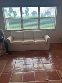 White sofa with removable slipcover