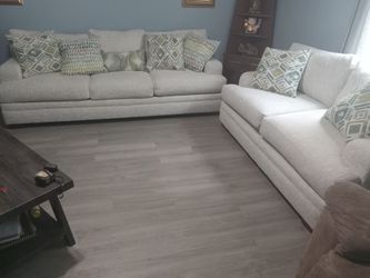 Like new couch and loveseat with pillows cash only in excellent condition