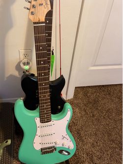 Electric guitars and amp + extras