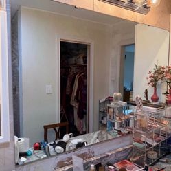 MIRROR  51 3/4"w x 33 3/4"tall; has a chip (LOOK AT PIC); cross streets are Arapaho & Waterview