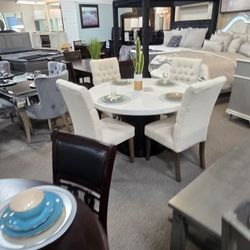 ALL STYLES DINING TABLE SETS STARTING AT $398 FINANCING OPTIONS AVAILABLE 
