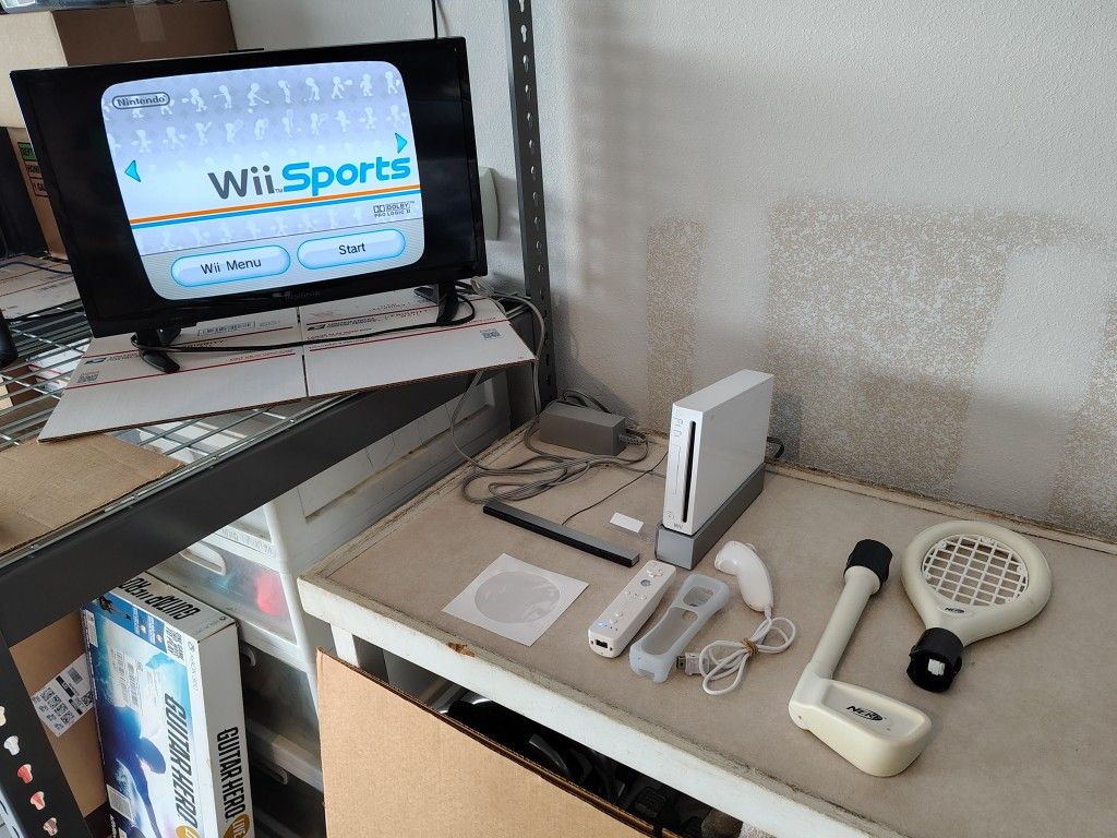 Nintendo Wii Bundle with Wii Sports, Remote, Nunchuck, etc.
