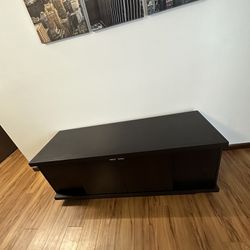Wood TV stand in great condition, dominoes is on the pictures 