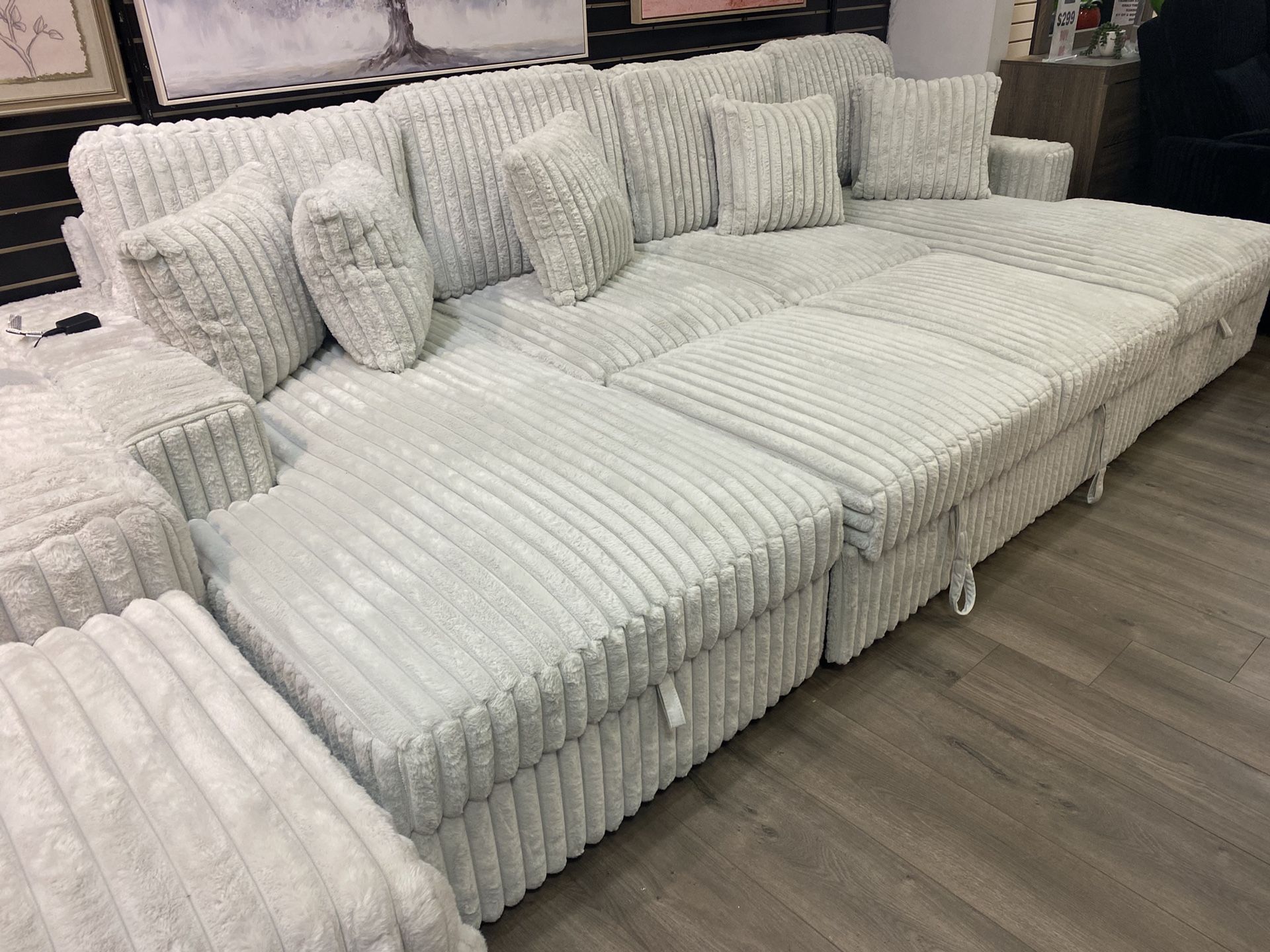 Pull out sectional Onsale $1100 Several Colores And Options Available