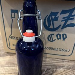 Blue cobalt glass bottles 16oz each. 