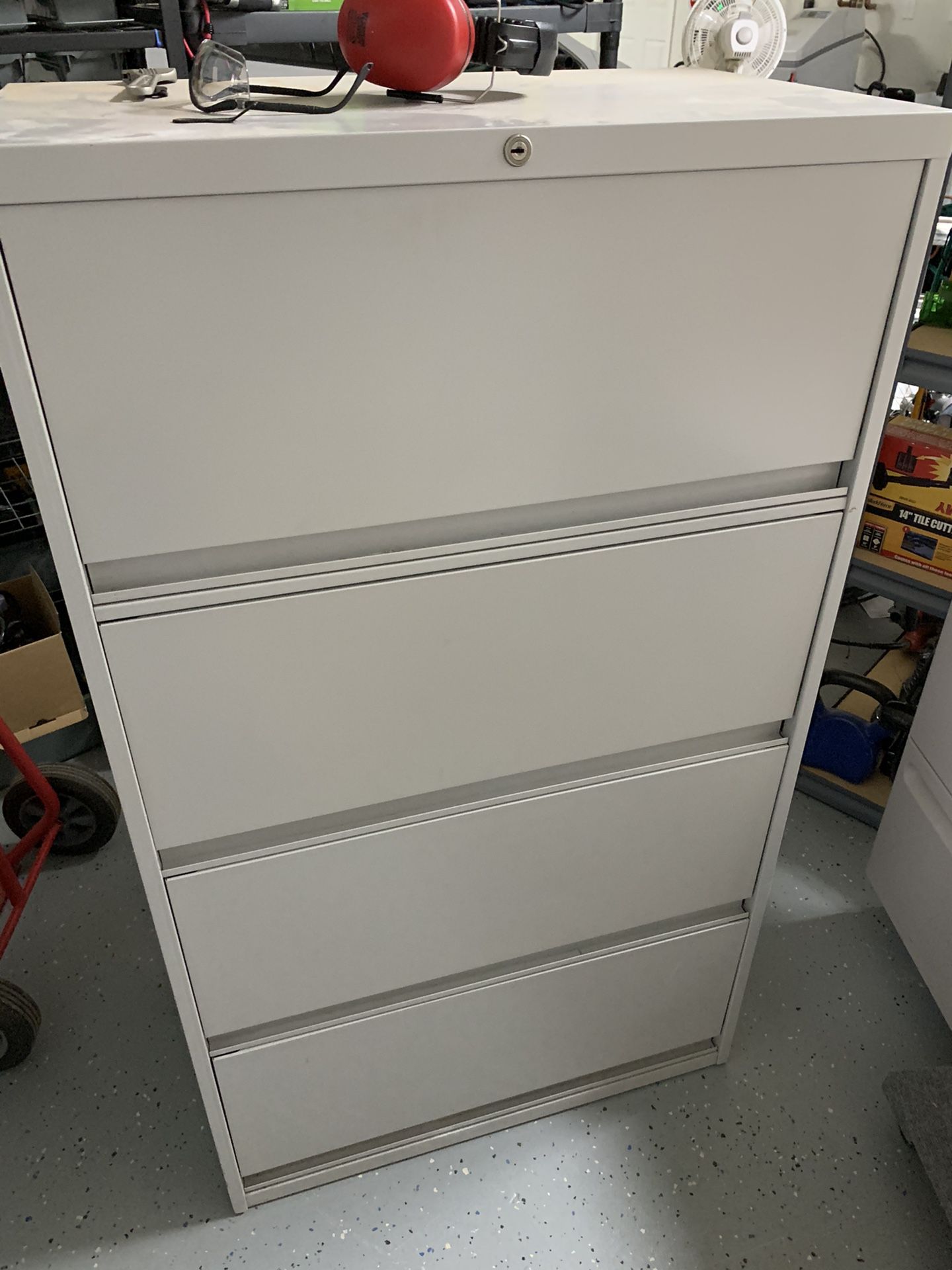 Vertical metal file cabinet