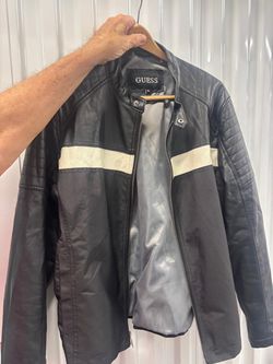 Guess black leather men’s waist jacket extra large with a white stripe. $50