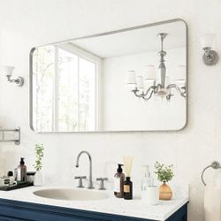 Y55 $45  55 in. W x 30 in. H Rectangular Aluminum Framed Wall Bathroom Vanity Mirror in Silver  With this elegant, framed design, black framed mirrors