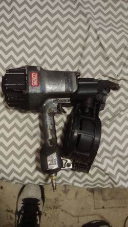Scenco coil framing nailer drives 15-degree wire-collated nails from 2 inches to 3-1/2 inches in