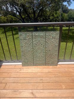 Three-piece distressed triptych mandala wall art panel.