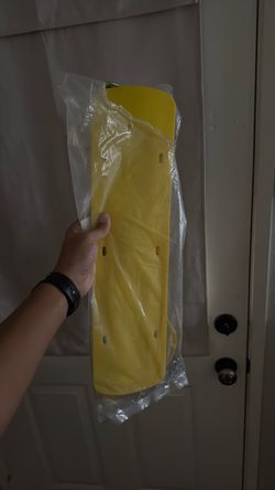 Yellow swing with chains