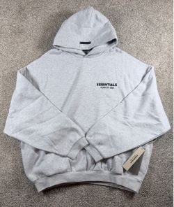 Light heather essential hoodie, Brand new with tags. Size Medium