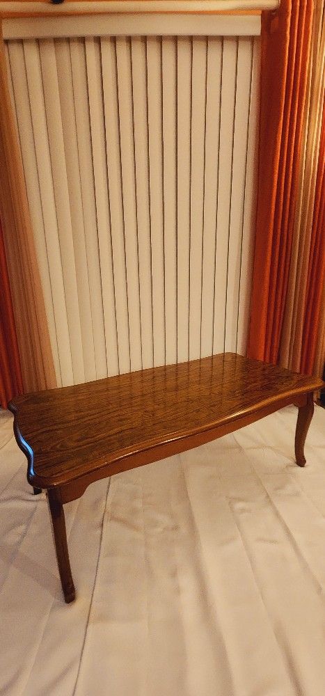 French coffee table standing on
cabriole legs with parquetry top,