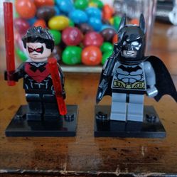 Original Batman Nightwing minifigure Legos plus pencil toppers from Comic-Con