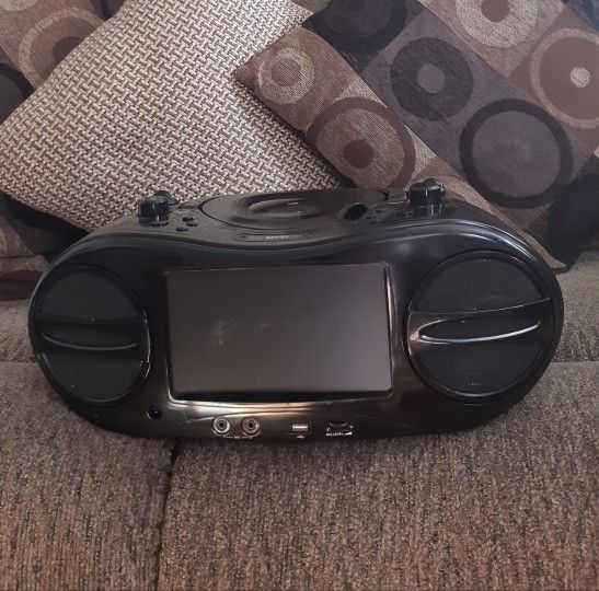 GPX Portable Music and Movie System . 7 in. screen. Radio and DVD/CD Player.