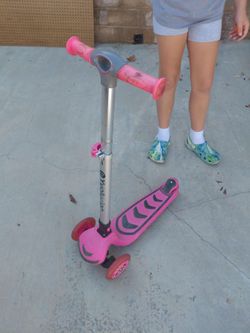 3 Wheeled pink scooter