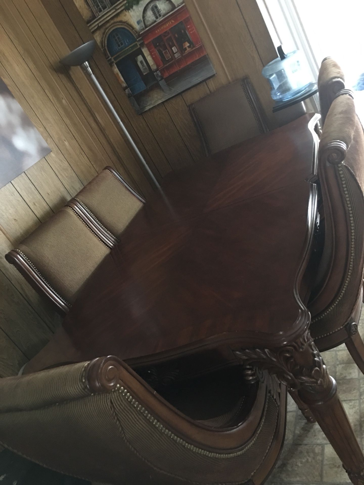 Solid wood dining table with six chairs and two extended if you want to make it bigger