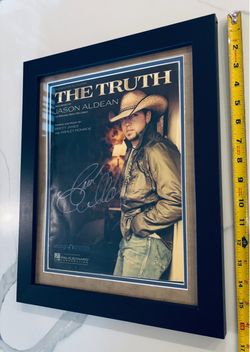 Jason Aldean signed and framed sheet music for “The Truth”.