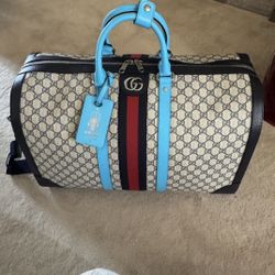 LE Gucci Duffle