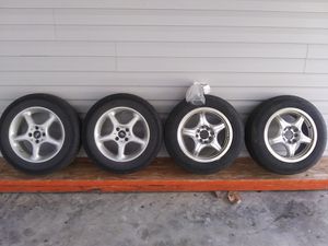 Photo 15 inch rubber decent for geo prism or toyota corrala maybe others just depends on lug pattern