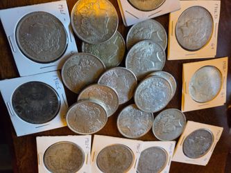 Silver dollars $65 Each or trade for old pocket watches