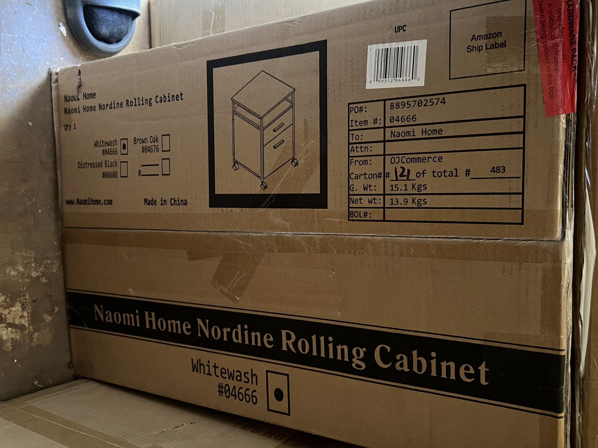 Brand new Naomi Home Nordine Rolling Cabinet in Whitewash (Model #04666). Still sealed in the original box — never opened.