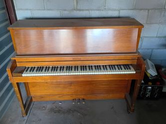 Baldwin upright piano with seat bench good shape works you must haul away Indian School and Dysart serious buyers only please no offers no trades