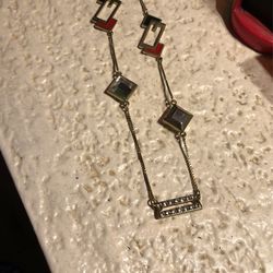 Guess. gold necklace black red enamel logo rhinestone links