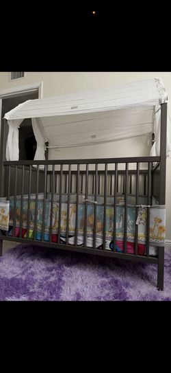 Baby crib with mattress